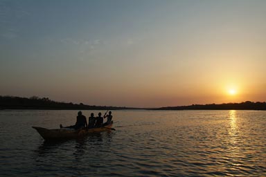 Buba, Pirogue, on sea, narrow inlet of the sea, sunset, nice colors, Guinea Bissau.