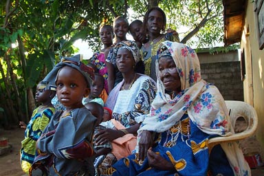 Lancinet's family, mother in middle, grandmother, Fanta his wife above, Conakry, 2007, Guinea, Guinee.