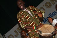Mamady Keita, or Mamadie, djembefola, or djembefolla, djembe percussion ballet made in Guinea. His groups name is Sewakan, Djembe d'or Festival, Conakry Guinea, Guinee.