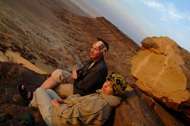 Robert and Birgit gazing into the sunrise on top of plateau