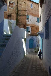 Chefchaouen, alley blue and white, boy