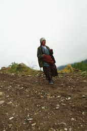 Old turkish women, walking trail countryside.
