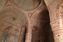 Ochre paintings in cave church dome. Cappadokia.