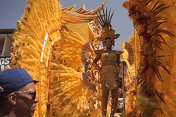 yellow feathered cart with golden feathered queen, carnaval, Las Tablas, Panama.