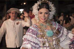 She dances along, always, a queen one day, a queen always, an expensive carnival dress, lots of gold, Las Tablas, Panama.