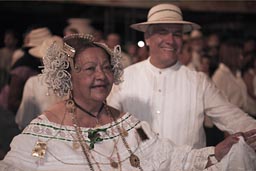 Happy posing elder carnival couple, Las Tablas.