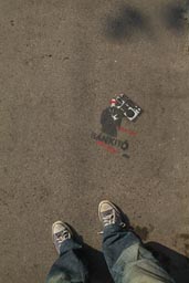 Sprayed mark on pavement, Convers in Budapest.