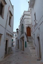 Locorotondo, centro storico, narrow street and steps.