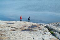 Exploring the rocks, harbour Bodo, Norway