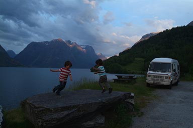 Sogne Fjord, camp, boys dance on table.
