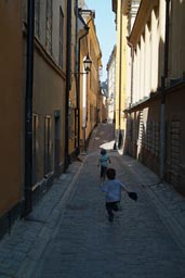 The boys roam the alleys of Stockholm.