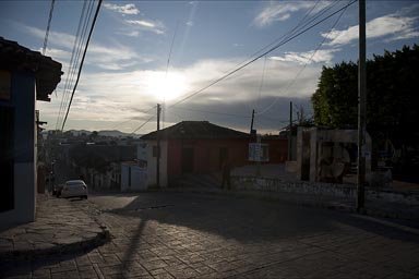 Small steep hilly street in Comitan, Chiapas, early morning.
