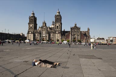 El Zocalo, old couple sleeping on ground, Mexico City..