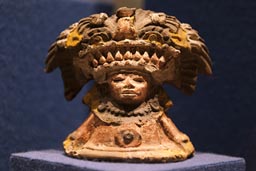 Little stone statue feathered decoration for the head, museum, Teotihuacan, Mexico.