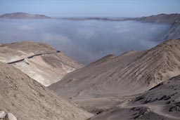 Coming from above, Lluta valley is full of fog, early morning. Northern Chile.