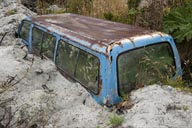 Chaiten, a minibus submerged by ash and debris that came with the lahar, following the volcano eruption.