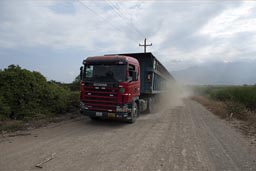 Sugar cane truck on dirt track, Northern Peru.