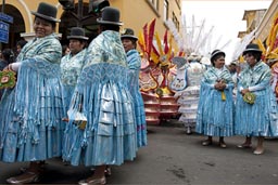All in turquoise, women from Puno, they later dance along the parade in Lima Independence Day in Peru. 
