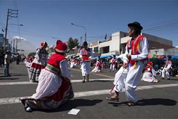 In back Volcan Misti, traditional Andean dances on Arequipa Day parade.