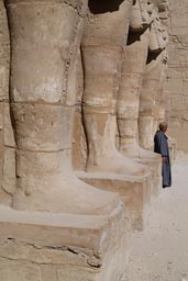 Arab man, Egyptian statues, Karnak Temple.