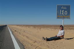 Desert road and road sign Egypt.