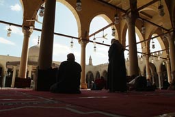 Mosque of Amr ibn al-As, Cairo. Mulsims pray.
