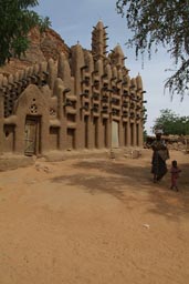New Dogon village of Telly, mosque. Woman and child.