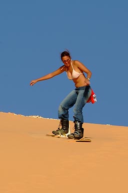 First try on snowboard in the dunes