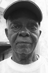 Harper, Maryland, Liberia, old African man with bad eye and cap, guardian of freemason temple.