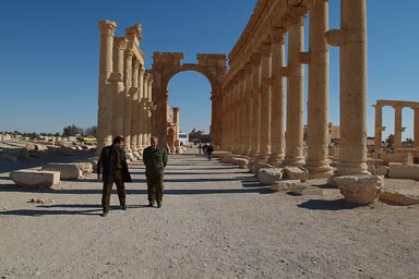 Decumanus, collonades, Palmyra, men walking.