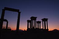Palmyra, new moon and silhuette of Tertapylon at dusk.