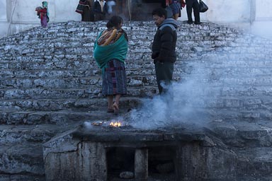 Incense burns on steps of Santo Tomaso  church in Chichicastenango, Guatemala.