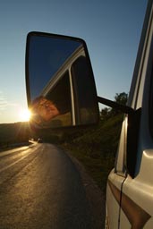 Me looking quit happy through mirror of the MB307, sunny evening after entering Romania.