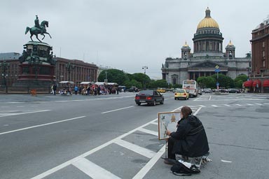 Painter in front ofSaint Isaac's. Petersburg.