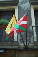 Arrano beltza, flying next to Basque flag in San Sebastian street.