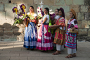 Girls and flower baskets, Oaxaca.