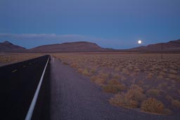 Full moon over road to Nevada.