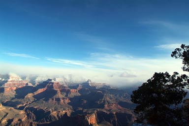 Blue skies, Grand Canyon and snowy tops.