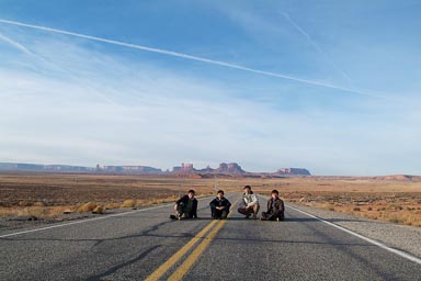 Asians, posing for photo, Monument Valley Road.