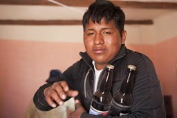 It is custom to serve two bottles, or make them as a present. Coipasa, fiesta de promocion 2012, Bolivia. 
