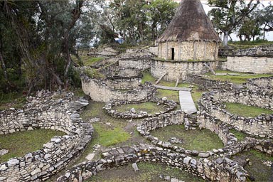 Inside the walls of Kuelap, reconstructed stone hut, residential quarters, Chachapoyas, Amazonas, Peru.