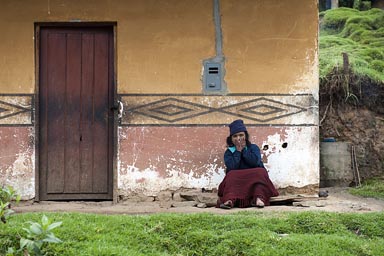 To sit outside her house, the same way as many hundreds of years ago, the painted decoration the same as in stone on the Kuelap walls. 