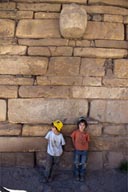 On wall of old temple, Tenon Head. My boys, Peru.
