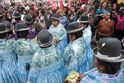 While waiting to parade, women from Puno, Independence Day in Peru. 