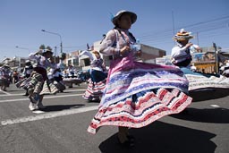 Bolleras, eleborately decorated folkloric Andino dresses, Arequipa Day, Peru. 